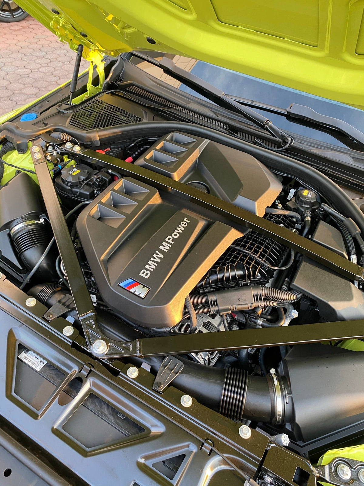 Factory S58 engine bay in a 2021 BMW G80 M3 Competition