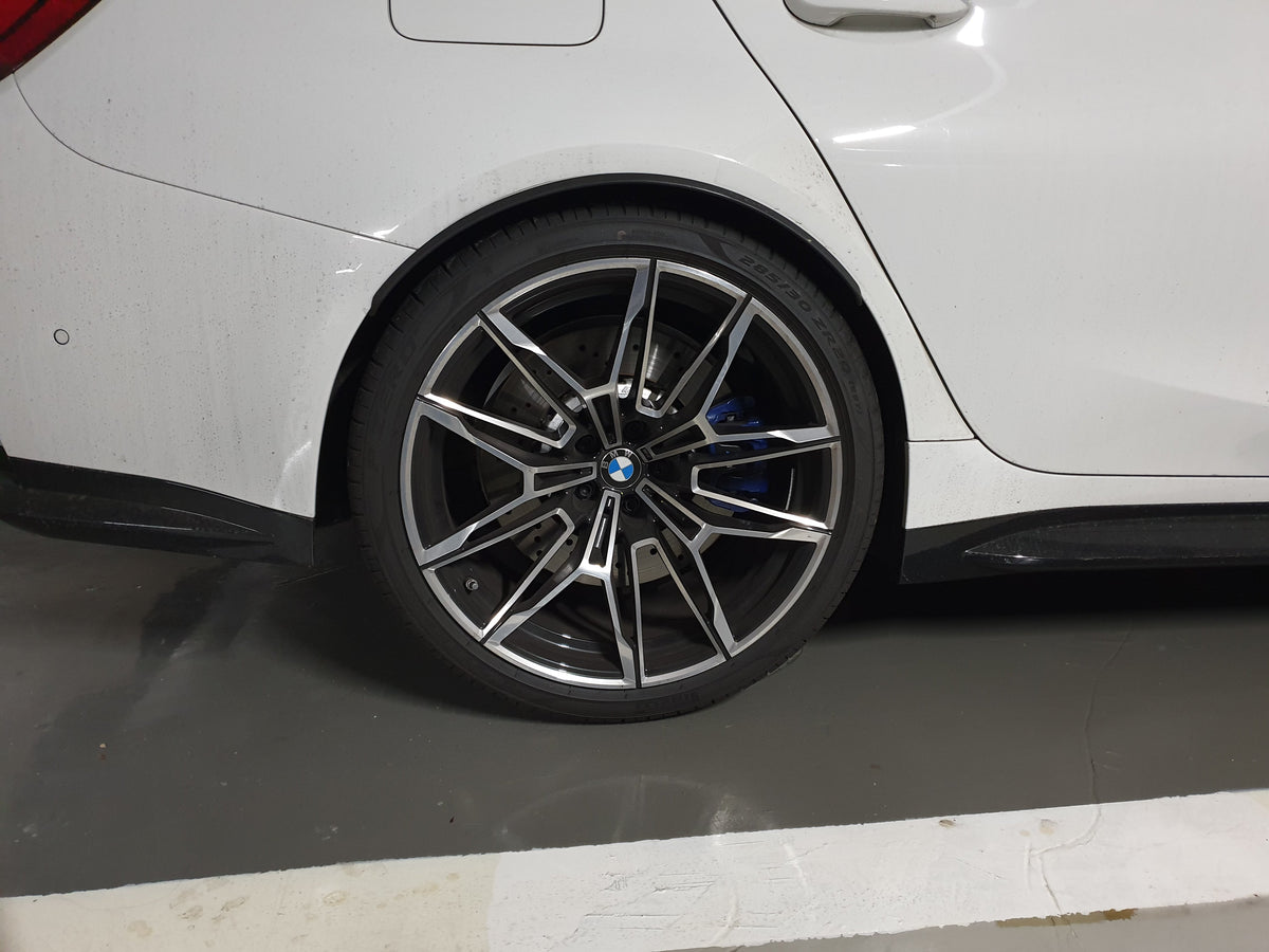 Factory BMW G80 M3 Competition wheel and tire detail